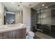 Contemporary bathroom featuring a glass shower enclosure, modern fixtures, and sleek tile at 37200 N Cave Creek Rd # 1023, Scottsdale, AZ 85262
