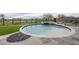 Backyard swimming pool and spa with adjacent golf course views and stone patio at 37200 N Cave Creek Rd # 1023, Scottsdale, AZ 85262