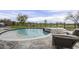 Backyard swimming pool, spa and adjacent golf course views provide an oasis at 37200 N Cave Creek Rd # 1023, Scottsdale, AZ 85262