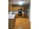 Kitchen with wood cabinets, stainless steel appliances, and ample counter space at 1302 W Estrella Dr, Chandler, AZ 85224