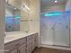Double sink bathroom with large walk-in shower at 13706 W Caballero Dr, Sun City West, AZ 85375