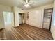 Bedroom with large closet and access to bathroom at 13706 W Caballero Dr, Sun City West, AZ 85375