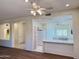 Kitchen with light wood cabinets, white countertops, and a breakfast bar at 13706 W Caballero Dr, Sun City West, AZ 85375
