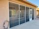 Exterior view of spacious screened patio at 13706 W Caballero Dr, Sun City West, AZ 85375
