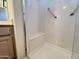Walk-in shower with built-in seat at 13706 W Caballero Dr, Sun City West, AZ 85375