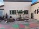 Southwest-style courtyard with decorative rocks and native plants at 13418 W Stardust Blvd, Sun City West, AZ 85375