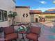 Relaxing courtyard oasis with seating and southwestern accents at 13418 W Stardust Blvd, Sun City West, AZ 85375