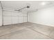 A spacious two car garage featuring an automatic garage door opener at 15995 W Cottontail Ln, Surprise, AZ 85387