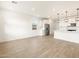 Bright living space features wood-style floors and modern finishes at 15995 W Cottontail Ln, Surprise, AZ 85387
