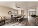 Open concept dining area featuring a rustic wooden table at 9240 E Broken Arrow Dr, Scottsdale, AZ 85262