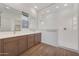 Modern bathroom with double vanity and walk-in glass shower at 28250 N 134Th Ave, Peoria, AZ 85383