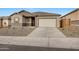 Charming single-Gathering home with a well-manicured front yard and an attached two-car garage at 28250 N 134Th Ave, Peoria, AZ 85383
