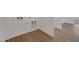 Hallway with wood-look tile next to the laundry hookups at 28250 N 134Th Ave, Peoria, AZ 85383