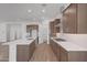 Modern kitchen featuring an island, stainless steel appliances, and sleek countertops at 28250 N 134Th Ave, Peoria, AZ 85383