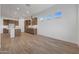 Modern kitchen featuring an island, stainless steel appliances, and sleek countertops at 28250 N 134Th Ave, Peoria, AZ 85383