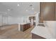 Modern kitchen featuring an island, stainless steel appliances, and sleek countertops at 28250 N 134Th Ave, Peoria, AZ 85383