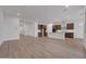 Open concept living room and kitchen featuring a modern design at 28250 N 134Th Ave, Peoria, AZ 85383