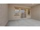 Covered backyard patio with smooth gray concrete at 28250 N 134Th Ave, Peoria, AZ 85383