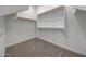 Spacious walk-in closet with ample shelving and clothing racks at 28250 N 134Th Ave, Peoria, AZ 85383