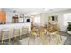 Open concept dining area with light wood table and chairs, near kitchen at 4159 E Gail Dr, Gilbert, AZ 85296