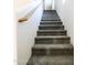 Carpeted staircase leading to upper level at 4159 E Gail Dr, Gilbert, AZ 85296