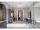 Spa-like bathroom with double vanity and walk-in shower at 10739 E Diamond Rim Dr, Scottsdale, AZ 85255