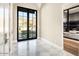 Bright entryway with marble flooring and views to the backyard at 10739 E Diamond Rim Dr, Scottsdale, AZ 85255