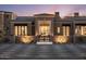 Elegant home entrance with a gated courtyard and mountain views at 10739 E Diamond Rim Dr, Scottsdale, AZ 85255