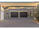 Two-car garage with porte-cochère entry at 10739 E Diamond Rim Dr, Scottsdale, AZ 85255
