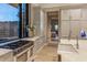 Modern kitchen with stainless steel appliances and light wood cabinets at 10739 E Diamond Rim Dr, Scottsdale, AZ 85255