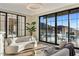 Relaxing living room with panoramic mountain and pool views at 10739 E Diamond Rim Dr, Scottsdale, AZ 85255