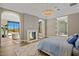 Spacious main bedroom with fireplace and access to private patio at 10739 E Diamond Rim Dr, Scottsdale, AZ 85255