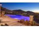 Stunning infinity pool and spa overlooking desert landscape at 10739 E Diamond Rim Dr, Scottsdale, AZ 85255