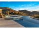 Resort style pool and spa with mountain backdrop at 10739 E Diamond Rim Dr, Scottsdale, AZ 85255