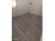Bright bedroom featuring updated vinyl flooring at 1219 E Barcelona Ave, Casa Grande, AZ 85122