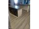 Kitchen boasts a large island with chalkboard detailing and modern flooring at 1219 E Barcelona Ave, Casa Grande, AZ 85122