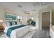 Bright bedroom with large windows, ceiling fan, and ensuite access at 1670 E Joseph Way, Gilbert, AZ 85295