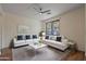 Living room featuring two white sofas and a coffee table at 1670 E Joseph Way, Gilbert, AZ 85295