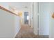 Upstairs hallway with carpet at 43594 W Bravo Ct, Maricopa, AZ 85138