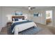 Main bedroom with ensuite bathroom and ample closet space at 43594 W Bravo Ct, Maricopa, AZ 85138