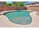 Large swimming pool with a pebble tec finish and turtle mosaics in a private backyard setting at 43594 W Bravo Ct, Maricopa, AZ 85138