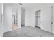 Bedroom with light gray carpet, neutral paint and a large closet is designed to maximize space at 5845 S Romano --, Mesa, AZ 85212