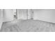 Large bedroom boasts neutral color palette and access to ensuite bathroom, enhancing modern comfort at 5845 S Romano --, Mesa, AZ 85212