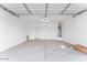 Spacious two-car garage with overhead lighting and ample space for vehicles and storage at 5845 S Romano --, Mesa, AZ 85212