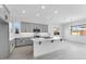 Spacious open-concept kitchen with large center island and stainless appliances at 5845 S Romano --, Mesa, AZ 85212
