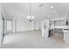 Open concept living space features light-filled open space with bright lighting at 5845 S Romano --, Mesa, AZ 85212