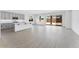 Bright open floor plan with a modern kitchen and a view to the patio at 5845 S Romano --, Mesa, AZ 85212