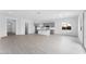 Bright, open living area with tile flooring, kitchen, and plenty of natural light at 5845 S Romano --, Mesa, AZ 85212