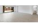 Bright, open living room with a sliding door and a bathroom with pedestal sink at 5845 S Romano --, Mesa, AZ 85212