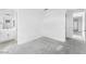 Minimalist bedroom featuring soft carpet, en-suite bathroom with a vanity, and neutral tones for a peaceful ambiance at 5851 S Romano --, Mesa, AZ 85212